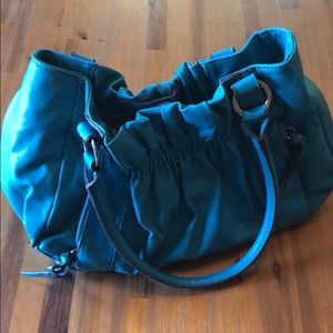 Turquoise leather bag!